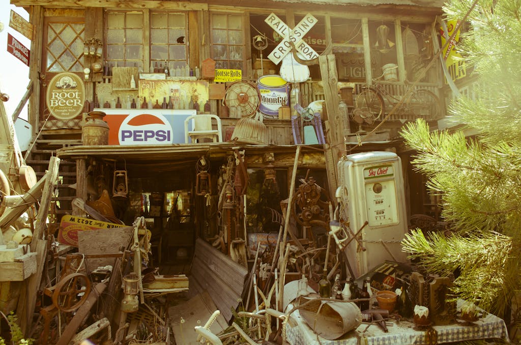 A vintage store filled with antique signs, rustic decor, and collectibles, creating a nostalgic ambiance.